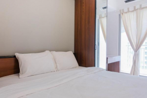 Comfortable 2BR Apartment Serpong M-Town Residence By Travelio